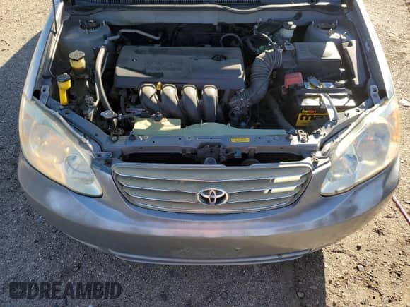 2003 Toyota Corolla CE с VIN 1NXBR32E83Z033572, выставлен на аукционе Copart как лот 82466225 с пробегом 228 151 миль миль и Списание • Salvage title. История ставок и продаж доступна на DreamBid. Изображение 11.