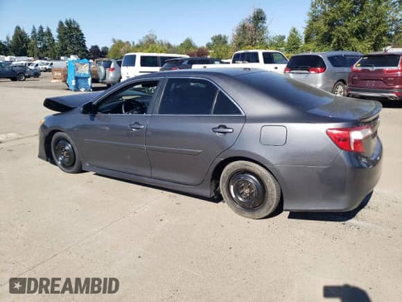 2012 Toyota Camry SE with VIN 4T1BK1FK4CU502567, listed as a Copart auction lot 69627055 with 210,202 mi miles and Salvage title. Bid and sale history available at DreamBid. Image 2.