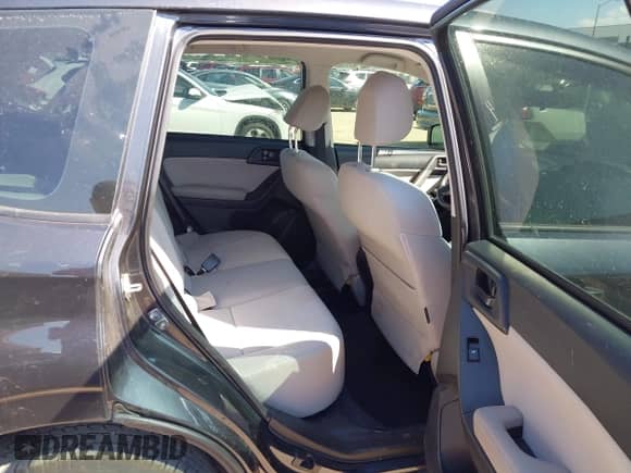 2016 Subaru Forester 2.5i z VIN JF2SJAAC7GH561412, wystawiony jako IAAI lot #43339319 z przebiegiem 130 234 mil mil oraz . Historia ofert i sprzedaży dostępna na DreamBid. Obrazek 8.