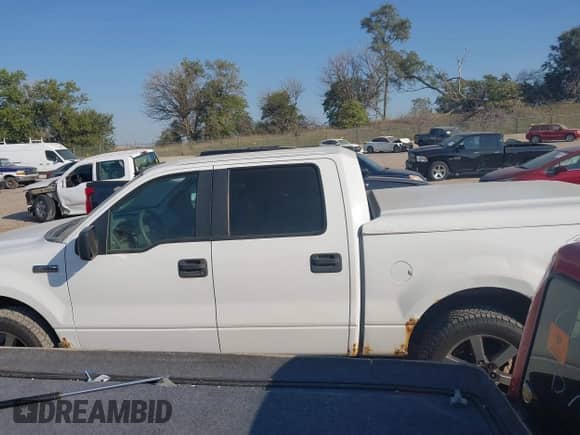 2007 Ford F-150 XLT с VIN 1FTPW14V07KC28099, выставлен на аукционе IAAI как лот 43375713 с пробегом 190 918 миль миль и . История ставок и продаж доступна на DreamBid. Изображение 14.