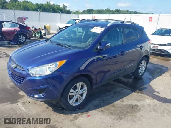 2012 Hyundai Tucson GLS z VIN KM8JUCAC4CU544786, wystawiony jako IAAI lot #42975389 z przebiegiem 113 703 mil mil oraz . Historia ofert i sprzedaży dostępna na DreamBid. Obrazek 2.