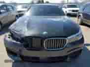 2017 BMW 7 Series 740e xDrive with VIN WBA7J2C33HG497980, listed as a Copart auction lot 50244384 with 115,728 mi miles and . Bid and sale history available at DreamBid. Image 5.