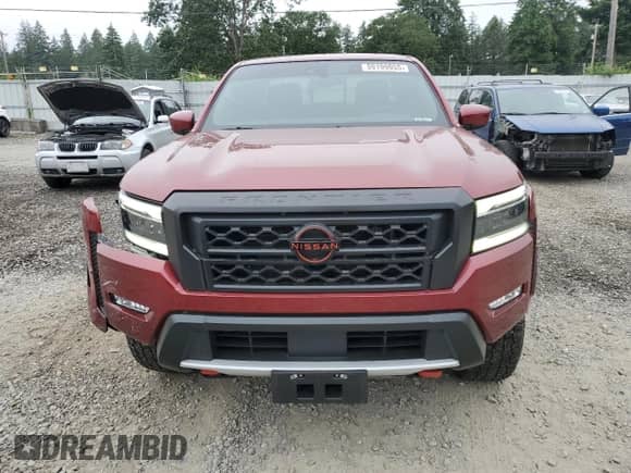 2023 Nissan Frontier SV with VIN 1N6ED1EK1PN619985, listed as a Copart auction lot 59199955 with 20,243 mi miles and Salvage title. Bid and sale history available at DreamBid. Image 5.