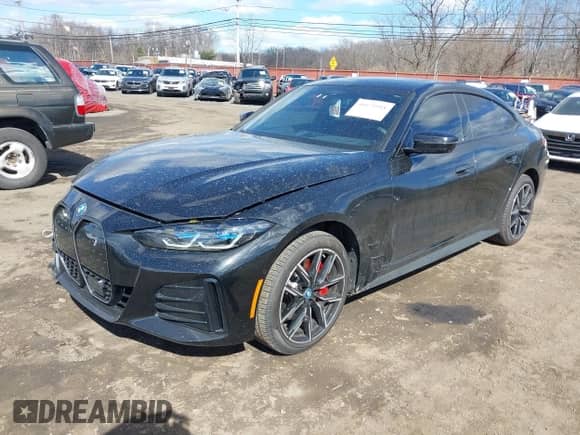 2024 BMW i4 xDrive40 с VIN WBY83FB04RFT19615, выставлен на аукционе IAAI как лот 41679918 с пробегом 3 883 миль миль и . История ставок и продаж доступна на DreamBid. Изображение 2.