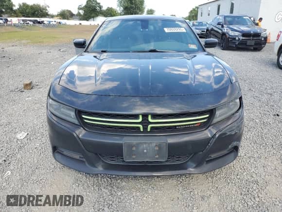 2015 Dodge Charger SE with VIN 2C3CDXFG1FH762857, listed as a Copart auction lot 70939295 with 170,821 mi miles and Salvage title. Bid and sale history available at DreamBid. Image 5.