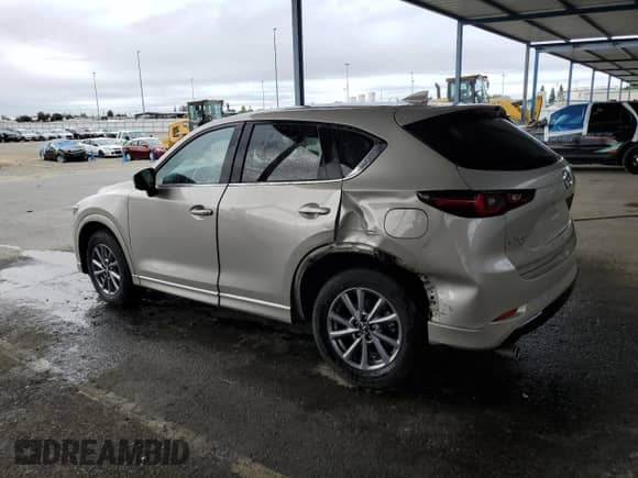 2024 Mazda CX-5 S Select with VIN JM3KFBBL7R0441526, listed as a Copart auction lot 84737085 with 33,500 mi miles and Salvage title. Bid and sale history available at DreamBid. Image 2.