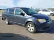 2013 Dodge Grand Caravan SE with VIN 2C4RDGBGXDR791339, listed as a IAAI auction lot 43387058 with 212,746 mi miles and . Bid and sale history available at DreamBid. Image 1.