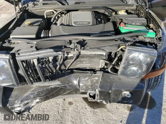 2007 Jeep Commander Overland with VIN 1J8HG68217C619277, listed as a Copart auction lot 82934414 with 136,282 mi miles and Salvage title. Bid and sale history available at DreamBid. Image 13.