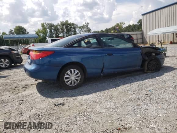 2002 Saturn SC with VIN 1G8ZP12852Z202191, listed as a Copart auction lot 64678935 with 170,757 mi miles and Salvage title. Bid and sale history available at DreamBid. Image 3.