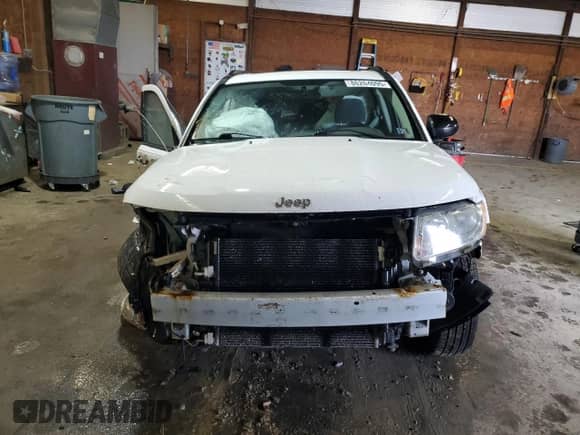 2011 Jeep Compass Latitude с VIN 1J4NT1FB2BD203909, выставлен на аукционе Copart как лот 86264095 с пробегом 183 351 миль миль и Списание • Salvage title. История ставок и продаж доступна на DreamBid. Изображение 5.