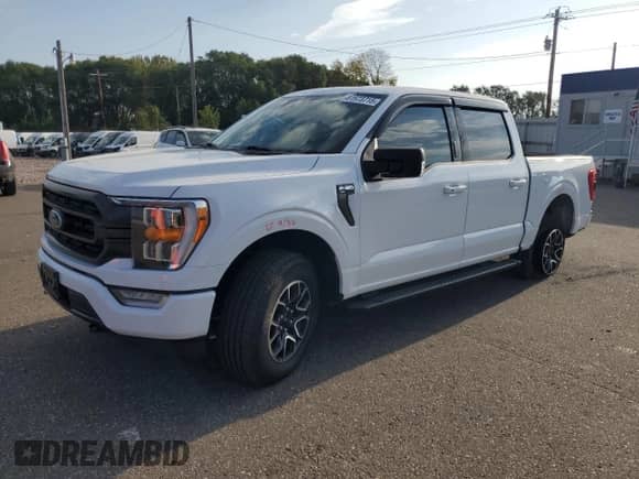 2021 Ford F-150 XLT с VIN 1FTFW1E80MFA61042, выставлен на аукционе Copart как лот 81973715 с пробегом 71 388 миль миль и Списание • Salvage title. История ставок и продаж доступна на DreamBid. Изображение 1.