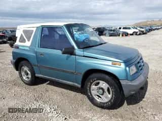 1996 Chevrolet Tracker с VIN 2CNBJ1869T6903615, выставлен на аукционе Copart как лот 49690055 с пробегом 144 821 миль миль и Списание • Salvage title. История ставок и продаж доступна на DreamBid. Изображение 4.