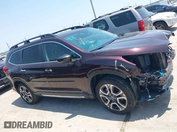 2024 Subaru Ascent Touring with VIN 4S4WMAWD6R3442402, listed as a IAAI auction lot 42209344 with 7,426 mi miles and . Bid and sale history available at DreamBid. Image 14.