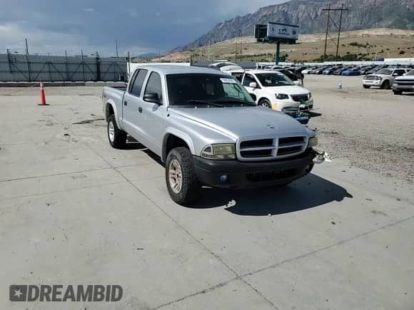 2003 Dodge Dakota Sport z VIN 1D7HG38X03S212560, wystawiony jako Copart lot #59052995 z przebiegiem 271 967 mil mil oraz Szkoda całkowita • Salvage title. Historia ofert i sprzedaży dostępna na DreamBid. Obrazek 13.