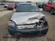 2004 Hyundai Accent GL z VIN KMHCG35C64U279929, wystawiony jako Copart lot #81661824 z przebiegiem 99 222 mil mil oraz Szkoda całkowita • Salvage title. Historia ofert i sprzedaży dostępna na DreamBid. Obrazek 5.