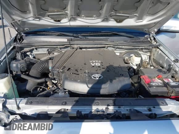 2013 Toyota Tacoma PreRunner z VIN 3TMKU4HN8DM034338, wystawiony jako IAAI lot #41808842 z przebiegiem 142 012 mil mil oraz . Historia ofert i sprzedaży dostępna na DreamBid. Obrazek 10.