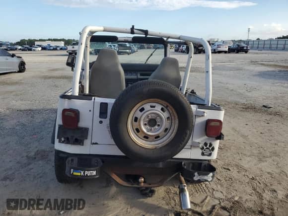 1993 Jeep Wrangler S с VIN 1J4FY19P7PP237637, выставлен на аукционе Copart как лот 70802755 с пробегом 127 470 миль миль и Списание • Salvage title. История ставок и продаж доступна на DreamBid. Изображение 6.