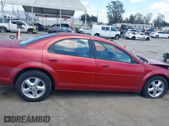 2006 Dodge Stratus SXT with VIN 1B3EL46X76N128726, listed as a IAAI auction lot 42194436 with 21,157 mi miles and . Bid and sale history available at DreamBid. Image 14.