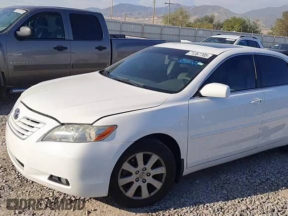 2009 Toyota Camry LE with VIN 4T1BK46K69U583632, listed as a Copart auction lot 71267705 with 107,208 mi miles and Salvage title. Bid and sale history available at DreamBid. Image 13.