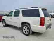 2014 Chevrolet Suburban LTZ with VIN 1GNSKKE79ER231994, listed as a Copart auction lot 71830095 with 152,865 mi miles and Clean title. Bid and sale history available at DreamBid. Image 2.
