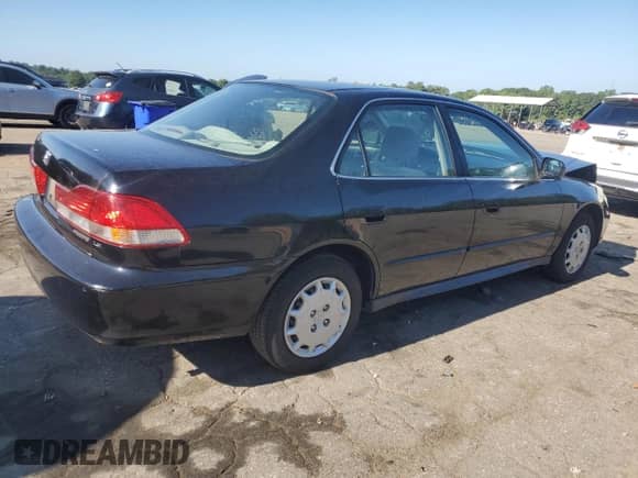 2002 Honda Accord LX with VIN JHMCG66502C009134, listed as a Copart auction lot 66456985 with 155,943 mi miles and Salvage title. Bid and sale history available at DreamBid. Image 3.