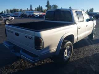2001 Dodge Dakota with VIN 1B7GG2AX81S127263, listed as a IAAI auction lot 43440179 with 256,284 mi miles and . Bid and sale history available at DreamBid. Image 4.