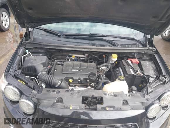 2014 Chevrolet Sonic LTZ with VIN 1G1JE6SBXE4212257, listed as a IAAI auction lot 41916104 with 71,956 mi miles and . Bid and sale history available at DreamBid. Image 10.
