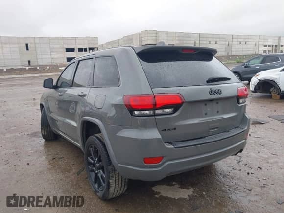2021 Jeep Grand Cherokee Laredo X with VIN 1C4RJFAG4MC690570, listed as a IAAI auction lot 42708592 with 64,547 mi miles and . Bid and sale history available at DreamBid. Image 3.
