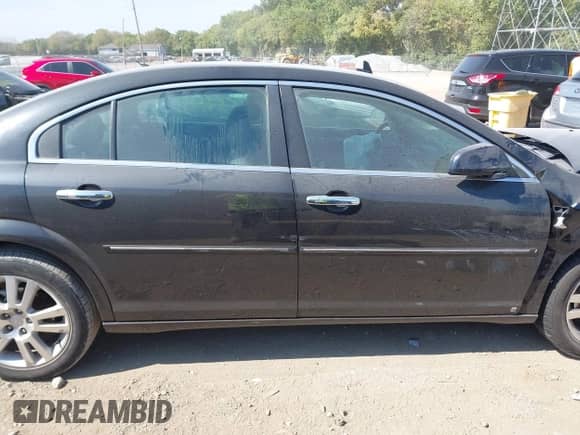 2009 Saturn Aura XR with VIN 1G8ZV57B89F242794, listed as a IAAI auction lot 43269449 with 140,602 mi miles and . Bid and sale history available at DreamBid. Image 13.