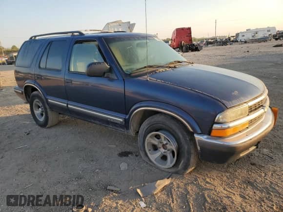 1999 Chevrolet Blazer LS z VIN 1GNCS13W9X2194269, wystawiony jako Copart lot #75468004 z przebiegiem 154 501 mil mil oraz Szkoda całkowita • Salvage title. Historia ofert i sprzedaży dostępna na DreamBid. Obrazek 4.
