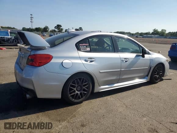 2015 Subaru WRX Premium with VIN JF1VA1D69F8815532, listed as a Copart auction lot 62452325 with 184,857 mi miles and Salvage title. Bid and sale history available at DreamBid. Image 3.