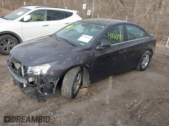 2016 Chevrolet Cruze LT z VIN 1G1PE5SB1G7163469, wystawiony jako IAAI lot #41700401 z przebiegiem 100 222 mil mil oraz . Historia ofert i sprzedaży dostępna na DreamBid. Obrazek 2.