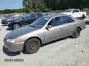 2000 Toyota Camry CE z VIN 4T1BG28K7YU664852, wystawiony jako Copart lot #80159975 z przebiegiem 247 780 mil mil oraz Szkoda całkowita • Salvage title. Historia ofert i sprzedaży dostępna na DreamBid. Obrazek 1.