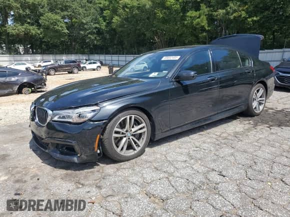 2016 BMW 7 Series 750i xDrive с VIN WBA7F2C58GG420362, выставлен на аукционе Copart как лот 69682485 с пробегом 79 928 миль миль и Списание • Salvage title. История ставок и продаж доступна на DreamBid. Изображение 1.