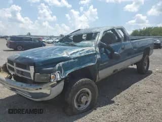 1999 Dodge 2500 with VIN 3B7KF2360XG203981, listed as a Copart auction lot 62489195 with Not provided miles and Salvage title. Bid and sale history available at DreamBid. Image 1.