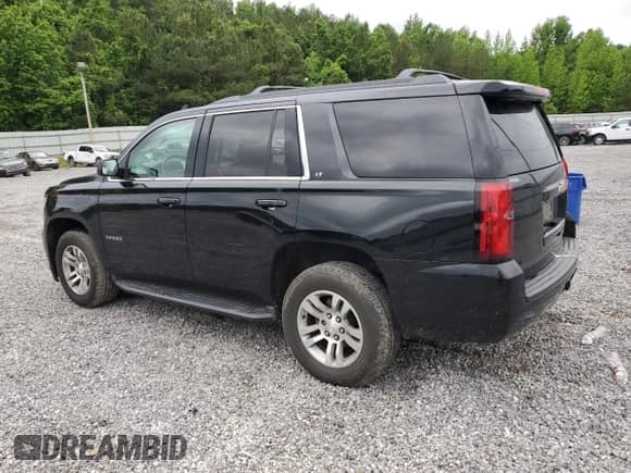 2016 Chevrolet Tahoe LT with VIN 1GNSCBKC1GR232218, listed as a Copart auction lot 56054325 with 87,463 mi miles and Salvage title. Bid and sale history available at DreamBid. Image 2.