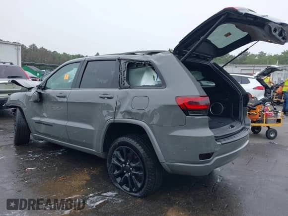 2021 Jeep Grand Cherokee Laredo X with VIN 1C4RJFAG2MC589415, listed as a IAAI auction lot 42514387 with 66,033 mi miles and . Bid and sale history available at DreamBid. Image 3.