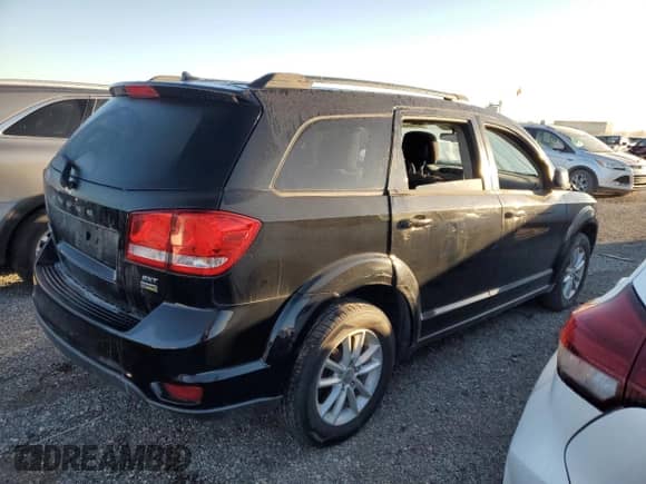 2014 Dodge Journey SXT with VIN 3C4PDCBG1ET191744, listed as a Copart auction lot 87368035 with Not provided miles and Salvage title. Bid and sale history available at DreamBid. Image 3.