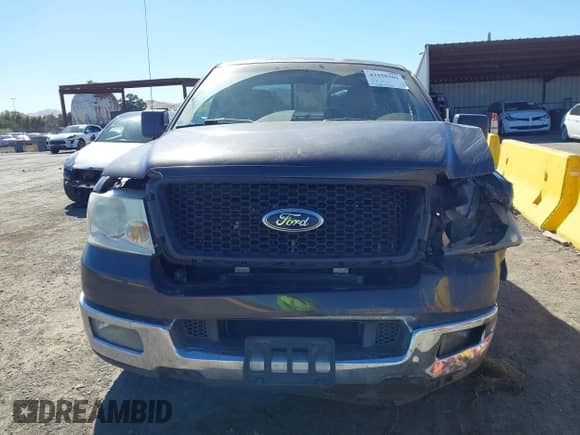 2005 Ford F-150 XLT with VIN 1FTRX12565KE53472, listed as a IAAI auction lot 43358301 with 195,394 mi miles and . Bid and sale history available at DreamBid. Image 12.