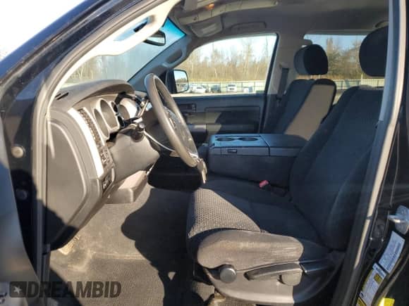 2012 Toyota Tundra with VIN 5TFDY5F13CX218615, listed as a Copart auction lot 90058035 with 130,918 mi miles and Salvage title. Bid and sale history available at DreamBid. Image 7.