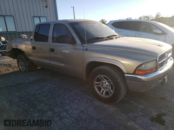 2003 Dodge Dakota SLT with VIN 1D7HL48N53S104919, listed as a Copart auction lot 86832215 with 179,130 mi miles and Salvage title. Bid and sale history available at DreamBid. Image 4.