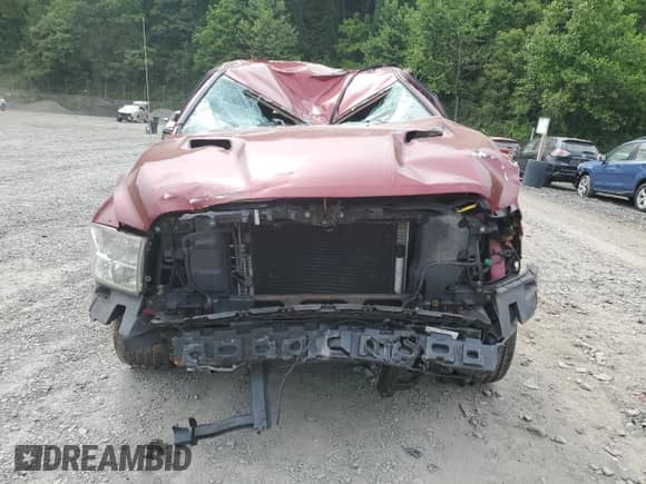 2014 Ram 1500 Express z VIN 1C6RR7FTXES186186, wystawiony jako Copart lot #58702185 z przebiegiem Nie podano mil oraz Szkoda całkowita • Salvage title. Historia ofert i sprzedaży dostępna na DreamBid. Obrazek 5.