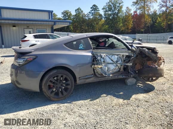 2015 Hyundai Genesis Coupe R-Spec with VIN KMHHU6KJ5FU122785, listed as a Copart auction lot 77006244 with Not provided miles and Salvage title. Bid and sale history available at DreamBid. Image 3.