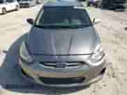 2014 Hyundai Accent GLS z VIN KMHCT4AEXEU591164, wystawiony jako Copart lot #82646655 z przebiegiem 135 583 mil mil oraz Czysty tytuł • Clean title. Historia ofert i sprzedaży dostępna na DreamBid. Obrazek 5.