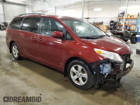 2014 Toyota Sienna LE AAS with VIN 5TDKK3DCXES461817, listed as a Copart auction lot 71806975 with 187,895 mi miles and Non repairable. Bid and sale history available at DreamBid. Image 4.