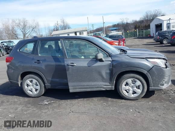 2022 Subaru Forester z VIN JF2SKAAC9NH410405, wystawiony jako IAAI lot #41636802 z przebiegiem 87 056 mil mil oraz . Historia ofert i sprzedaży dostępna na DreamBid. Obrazek 13.