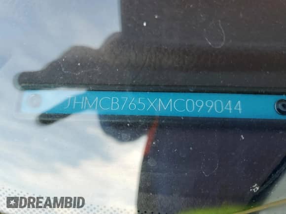 1991 Honda Accord LX z VIN JHMCB765XMC099044, wystawiony jako Copart lot #42520935 z przebiegiem 165 870 mil mil oraz Szkoda całkowita • Salvage title. Historia ofert i sprzedaży dostępna na DreamBid. Obrazek 13.