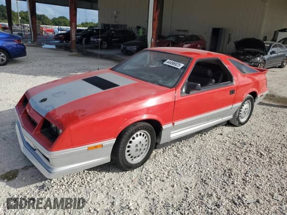 1986 Dodge Daytona with VIN 1B3BA64E7GG134747, listed as a Copart auction lot 44496925 with Not provided miles and Salvage title. Bid and sale history available at DreamBid. Image 1.
