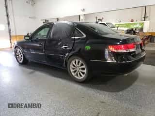 2006 Hyundai Azera SE с VIN KMHFC46F46A056168, выставлен на аукционе Copart как лот 85765045 с пробегом 103 335 миль миль и Чистый • Clean title. История ставок и продаж доступна на DreamBid. Изображение 2.