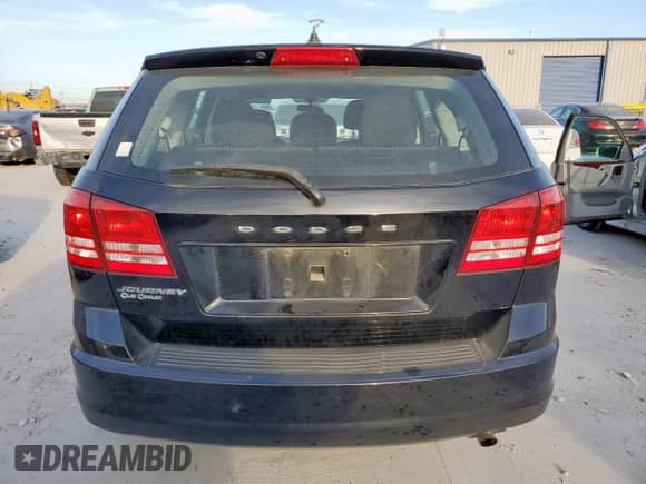 2014 Dodge Journey American Value with VIN 3C4PDCAB1ET283961, listed as a Copart auction lot 65348255 with 200,998 mi miles and Salvage title. Bid and sale history available at DreamBid. Image 6.